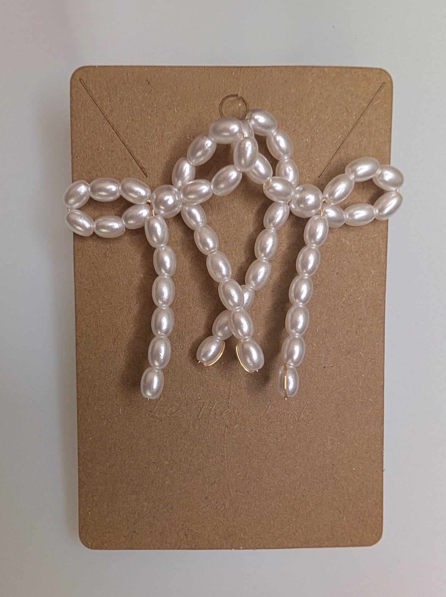 Sweetheart Pearl Bow Studs